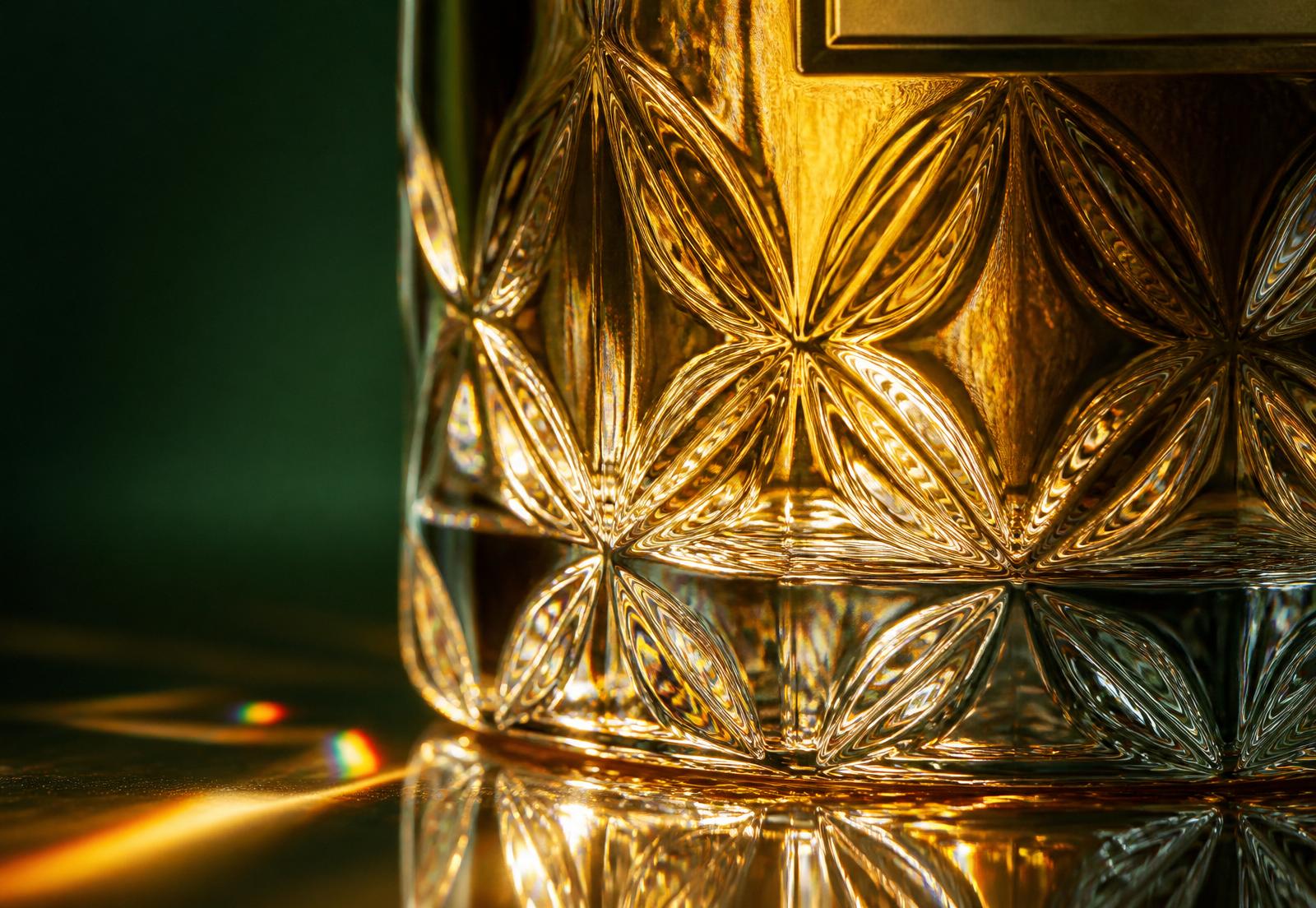 Macro of the diamond-cut BOQO bottle base refracting light